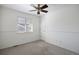 Bright bedroom featuring a ceiling fan and a window that provides lots of natural light at 13846 Harrison Dr, Thornton, CO 80602