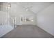 Bright and airy living room showcasing a vaulted ceiling and large bay window that brings in natural light at 13846 Harrison Dr, Thornton, CO 80602