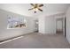 Spacious primary bedroom with vaulted ceilings and a ceiling fan at 13846 Harrison Dr, Thornton, CO 80602