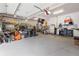 Spacious garage with epoxy flooring and ample storage for vehicles and equipment at 60 Barton Ridge Dr, Breckenridge, CO 80424