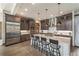 Modern kitchen with stainless steel appliances, a large island, and elegant cabinetry offers a perfect space for culinary adventures at 60 Barton Ridge Dr, Breckenridge, CO 80424