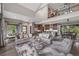 Expansive open-concept living area seamlessly connects the living room, kitchen, and dining area with stylish finishes at 60 Barton Ridge Dr, Breckenridge, CO 80424