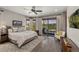 Main bedroom with mountain views, a ceiling fan, and hardwood floors at 60 Barton Ridge Dr, Breckenridge, CO 80424