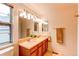 Bathroom featuring double sinks and vanity at 9614 W Powers Cir, Littleton, CO 80123