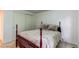 Neutral bedroom features a comfortable bed, and closet space at 9614 W Powers Cir, Littleton, CO 80123