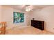 Bedroom with ceiling fan, carpet, and natural light at 9614 W Powers Cir, Littleton, CO 80123