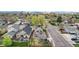 Aerial view showcasing a residential neighborhood with well-maintained homes and lush greenery at 800 S Krameria St, Denver, CO 80224