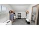 Bright attic featuring carpet, storage, and natural light at 800 S Krameria St, Denver, CO 80224