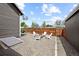 Cozy backyard with a gravel patio area, perfect for outdoor seating and entertaining around a fire pit at 800 S Krameria St, Denver, CO 80224