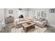 Relaxing living room featuring modern decor, neutral-toned furnishings and access to the study at 800 S Krameria St, Denver, CO 80224