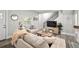 Comfortable living room featuring modern decor, neutral-toned furnishings, and plenty of natural light at 800 S Krameria St, Denver, CO 80224