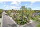 Beautiful street view showcasing a charming home with mature trees and well-maintained landscaping at 800 S Krameria St, Denver, CO 80224