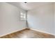 Bright bedroom with hardwood floors and neutral walls at 2290 S Irving St, Denver, CO 80219