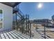 Modern balcony with metal railings offering expansive city views at 2460 W 29Th Ave # 303, Denver, CO 80211