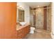 Modern bathroom with walk-in shower and granite vanity at 2460 W 29Th Ave # 303, Denver, CO 80211