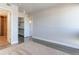 Bedroom with access to bathroom and closet at 2460 W 29Th Ave # 303, Denver, CO 80211