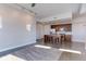 Open concept kitchen and living area with modern cabinetry and stainless steel appliances at 2460 W 29Th Ave # 303, Denver, CO 80211