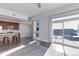Bright living room featuring large windows and city views at 2460 W 29Th Ave # 303, Denver, CO 80211