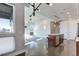Open concept living room and kitchen with modern finishes at 2460 W 29Th Ave # 303, Denver, CO 80211
