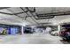 Secure parking garage with ample space for residents at 2460 W 29Th Ave # 303, Denver, CO 80211