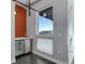 Modern wet bar with wine cooler and city view at 2460 W 29Th Ave # 303, Denver, CO 80211