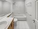 Well-lit bathroom with soaking tub and double sink at 124 High Country Trl, Lafayette, CO 80026