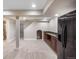 Finished basement featuring recessed lighting, a wet bar, and plenty of open space for entertaining at 3314 Astorbrook Cir, Highlands Ranch, CO 80126