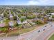 Overhead shot of residential area with mature tree coverage and an extra long mural at 690 W 1St Ave, Broomfield, CO 80020