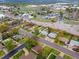 Aerial view of a quiet residential neighborhood with tree-lined streets and well-manicured lawns at 690 W 1St Ave, Broomfield, CO 80020