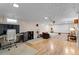 Finished basement with hardwood floors, home theater and room for entertaining at 690 W 1St Ave, Broomfield, CO 80020