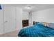 Cozy bedroom featuring neutral walls, carpet, and a dark dresser at 690 W 1St Ave, Broomfield, CO 80020