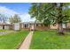 Charming single-story home with well-maintained lawn and beautiful landscaping at 690 W 1St Ave, Broomfield, CO 80020