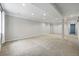 Spacious finished basement with neutral carpet, recessed lighting, and access to storage at 2130 Chestnut Cir, Erie, CO 80516