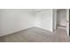 Bedroom features neutral carpet and a closet for storage at 2130 Chestnut Cir, Erie, CO 80516
