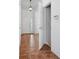Inviting foyer featuring tile flooring, white walls, and natural light streaming in through the front door at 2130 Chestnut Cir, Erie, CO 80516