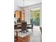 Kitchen featuring eat-in breakfast nook and sliding glass doors leading to the backyard at 2130 Chestnut Cir, Erie, CO 80516