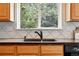 Close-up of kitchen sink, faucet and window above at 2130 Chestnut Cir, Erie, CO 80516