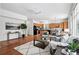 Open-concept living area showcasing a seamless blend of living, dining, and kitchen spaces at 2130 Chestnut Cir, Erie, CO 80516