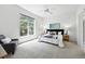 Bright main bedroom with a ceiling fan and large windows at 2130 Chestnut Cir, Erie, CO 80516