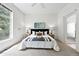 Spacious main bedroom featuring large windows and neutral decor at 2130 Chestnut Cir, Erie, CO 80516