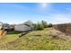 An expansive backyard with a partial fence at 1488 S Andes Way, Aurora, CO 80017