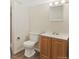 Bathroom featuring a toilet, vanity, mirror and walk-in shower at 1488 S Andes Way, Aurora, CO 80017