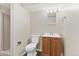 Bathroom featuring a toilet, vanity, mirror and walk-in shower at 1488 S Andes Way, Aurora, CO 80017