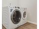 Well lit laundry room with washer and dryer at 1488 S Andes Way, Aurora, CO 80017