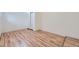 This empty bedroom has wood floors and a double closet at 1525 Roslyn St, Denver, CO 80220