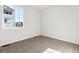 Spacious bedroom with large windows and neutral decor at 8588 Eagle River St, Littleton, CO 80125