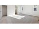 Spacious bedroom with ensuite bathroom access and ample sunlight at 8588 Eagle River St, Littleton, CO 80125