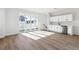 Living room features a wet bar and access to outdoor space at 8588 Eagle River St, Littleton, CO 80125