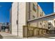 A view of the building exterior, highlighting private garages and contemporary architectural design at 2426 Welton St, Denver, CO 80205