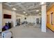 Bright gym featuring exercise equipment, mirrors, and a sleek design at 2426 Welton St, Denver, CO 80205